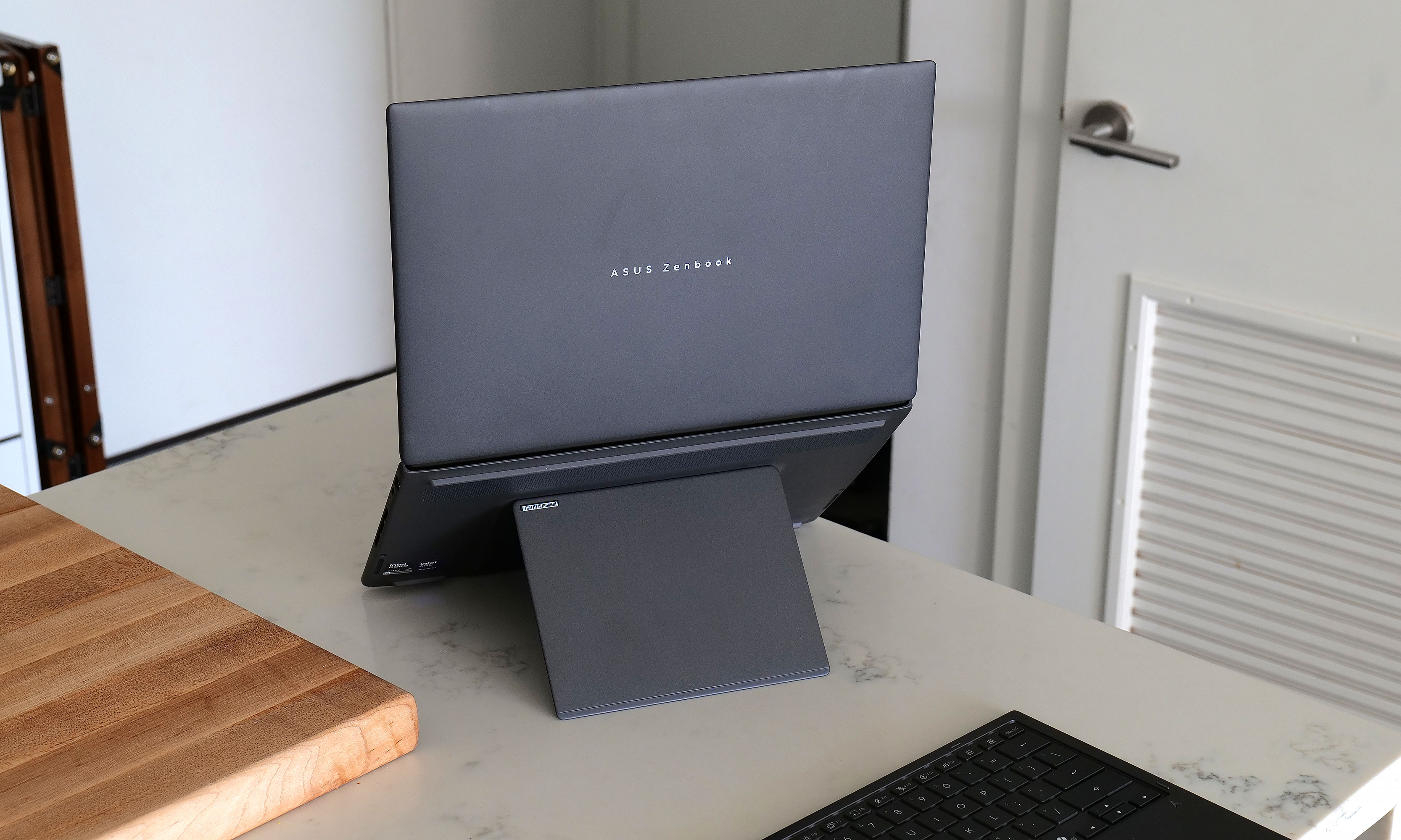 The kickstand in back adds a bit a bulk, but it's better than not having one at all like with Lenovo's Yoga Book. 