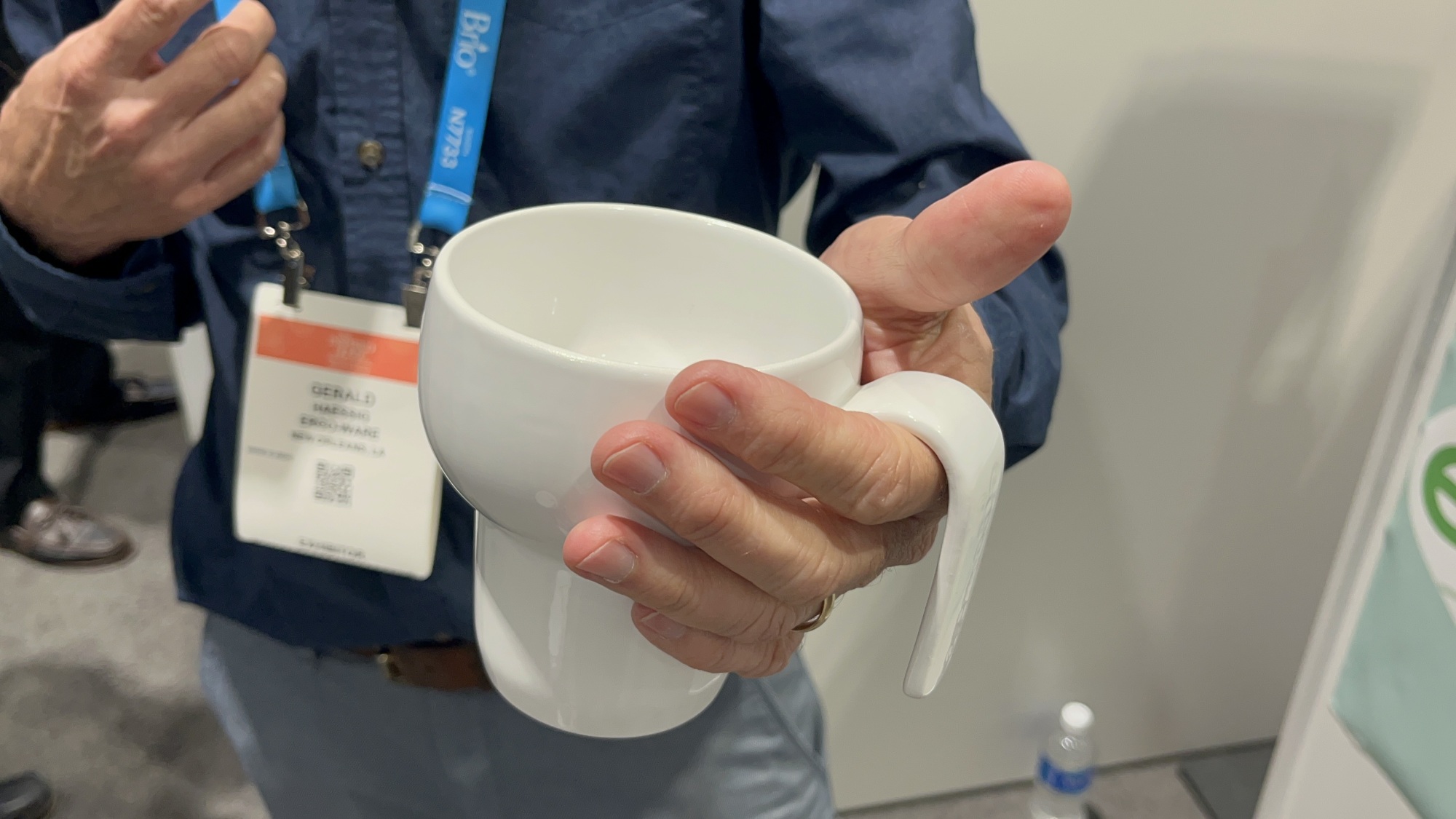 Gerald Haessig, founder of ErgoWare, holding an ErgoCup