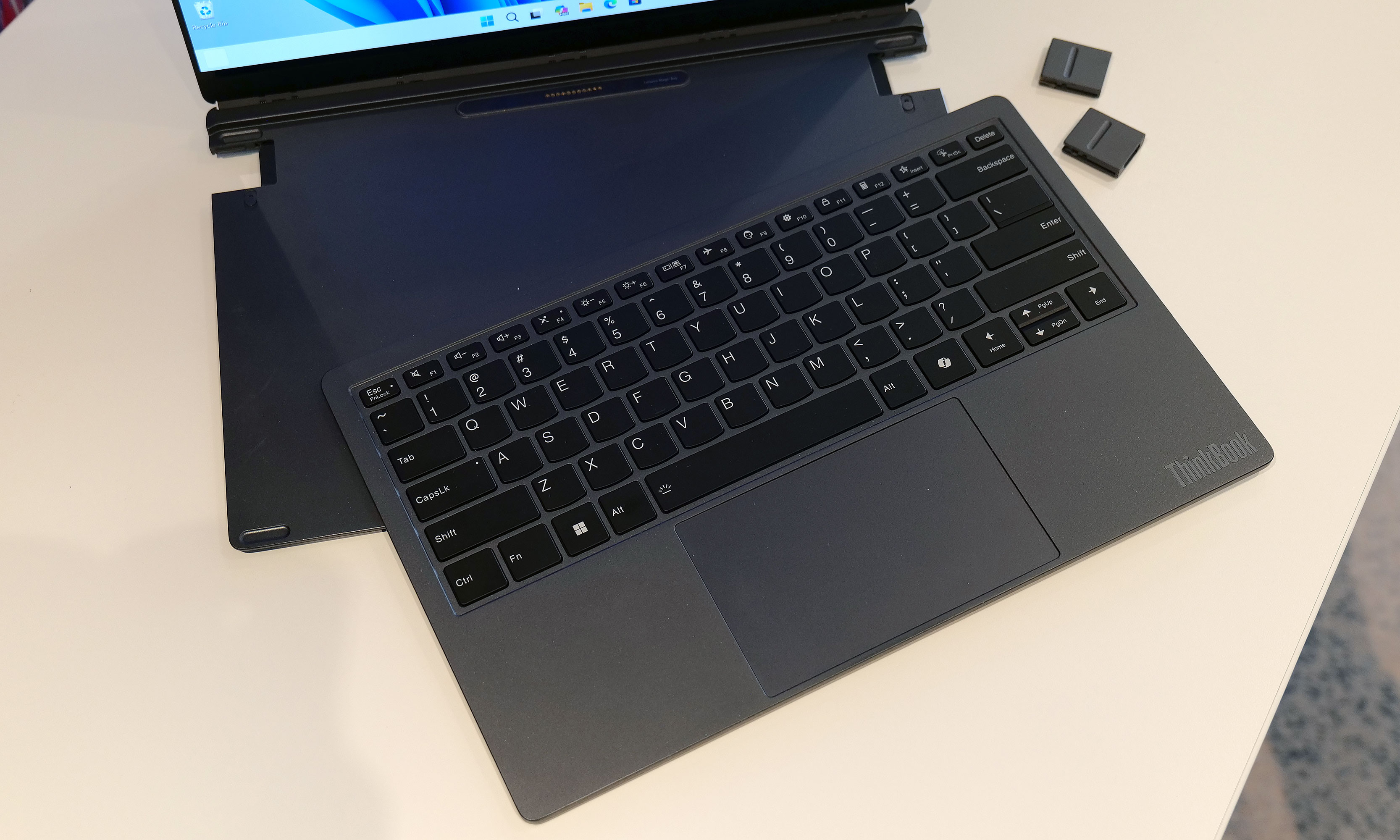The Lenovo Modular AI PC concept's keyboard and be completely removed at a moment's notice and positioned anywhere you like thanks to its Bluetooth connectivity.