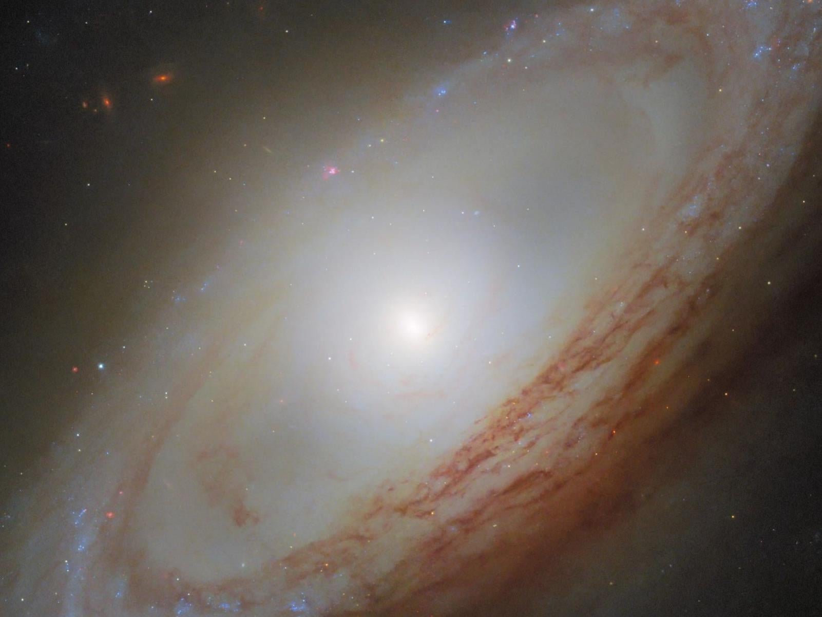 Hubble Captures Bizarre Spiral Galaxy Spinning In Two Directions At Once